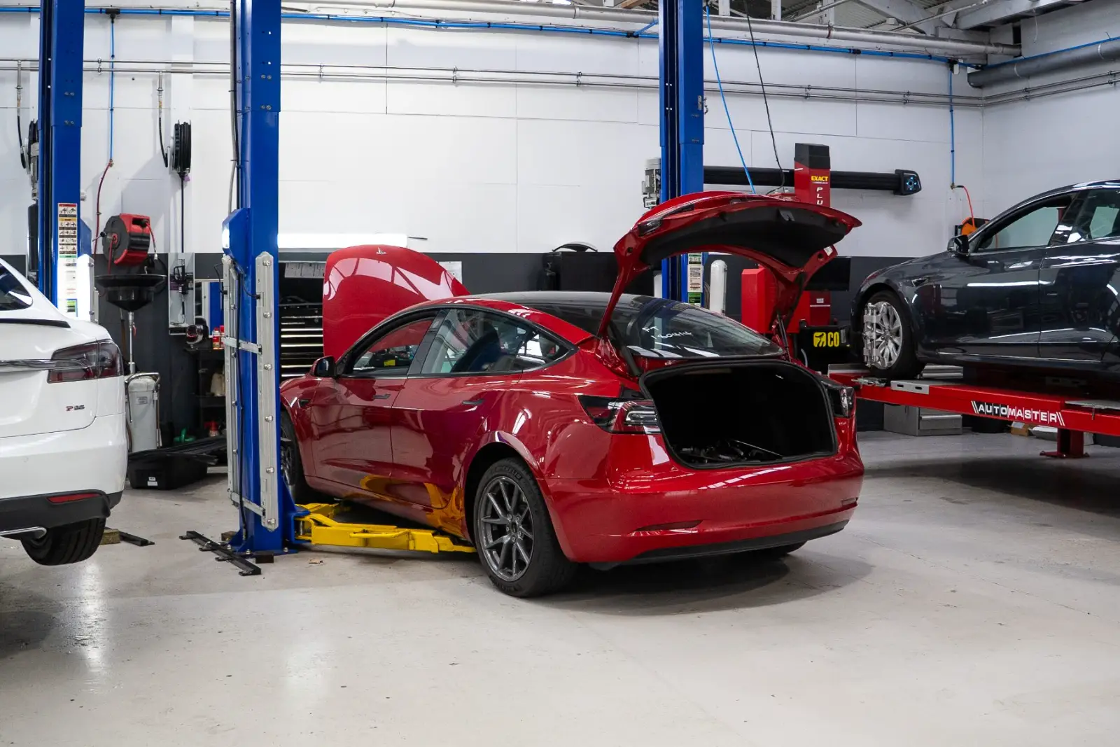 Tesla Model 3 on the hoist at GVI in Auckland