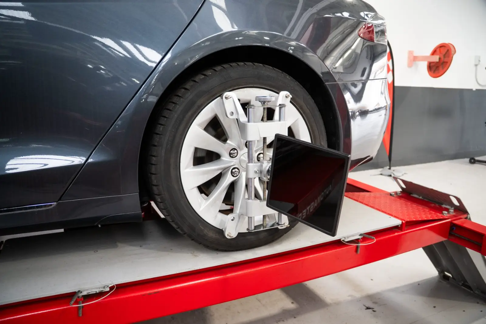 Tesla Model S on the wheel alignment rig at GVI Auckland