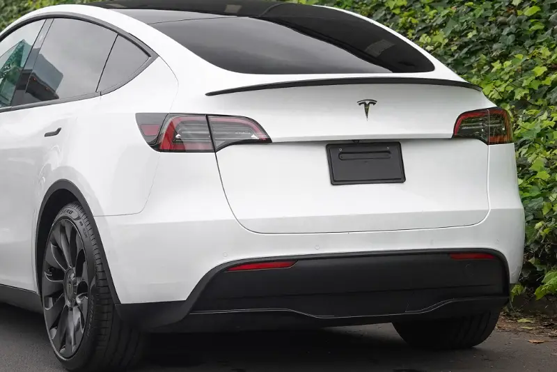 Rear detail of a Tesla Model Y in for service