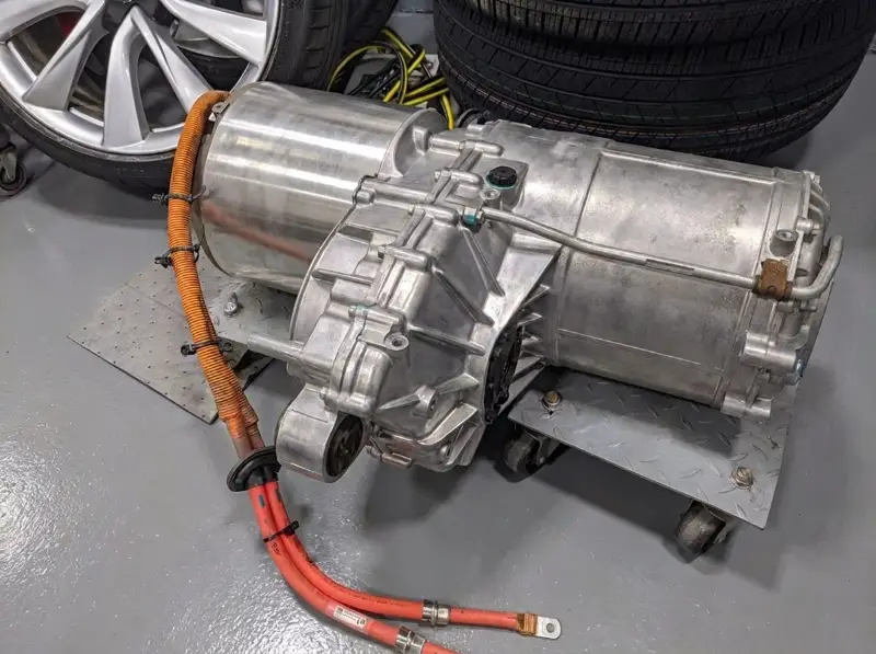 Tesla electric drive unit removed for replacement