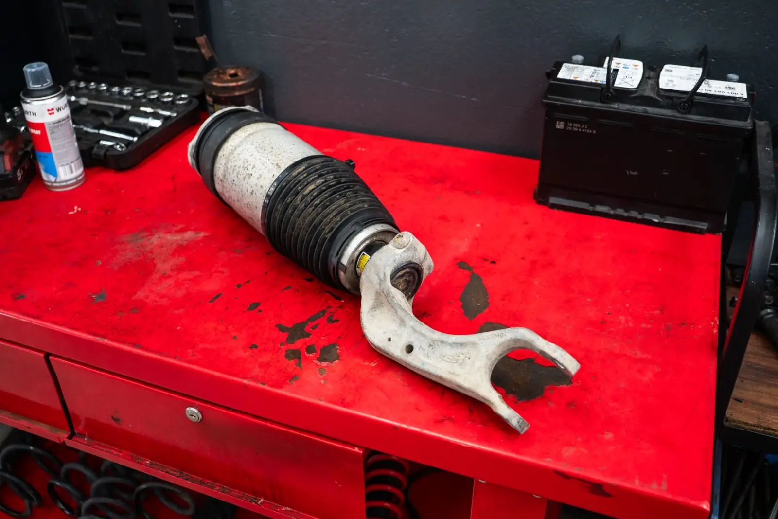 Tesla Model X air suspension strut removed from the car