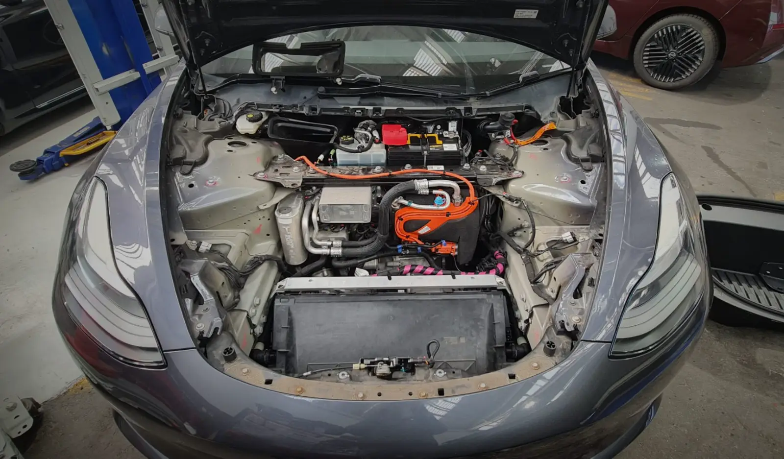 Warranty repair under way on a Tesla at GVI Penrose