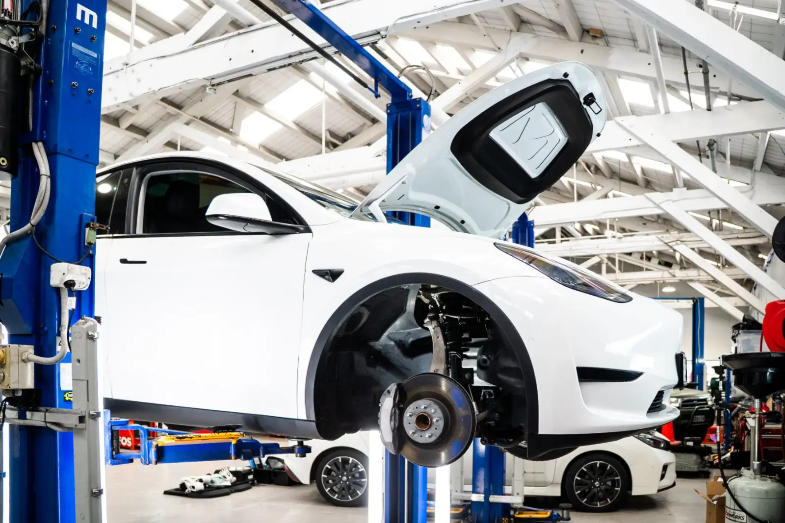 Tesla brake and suspension check during a WOF in Auckland