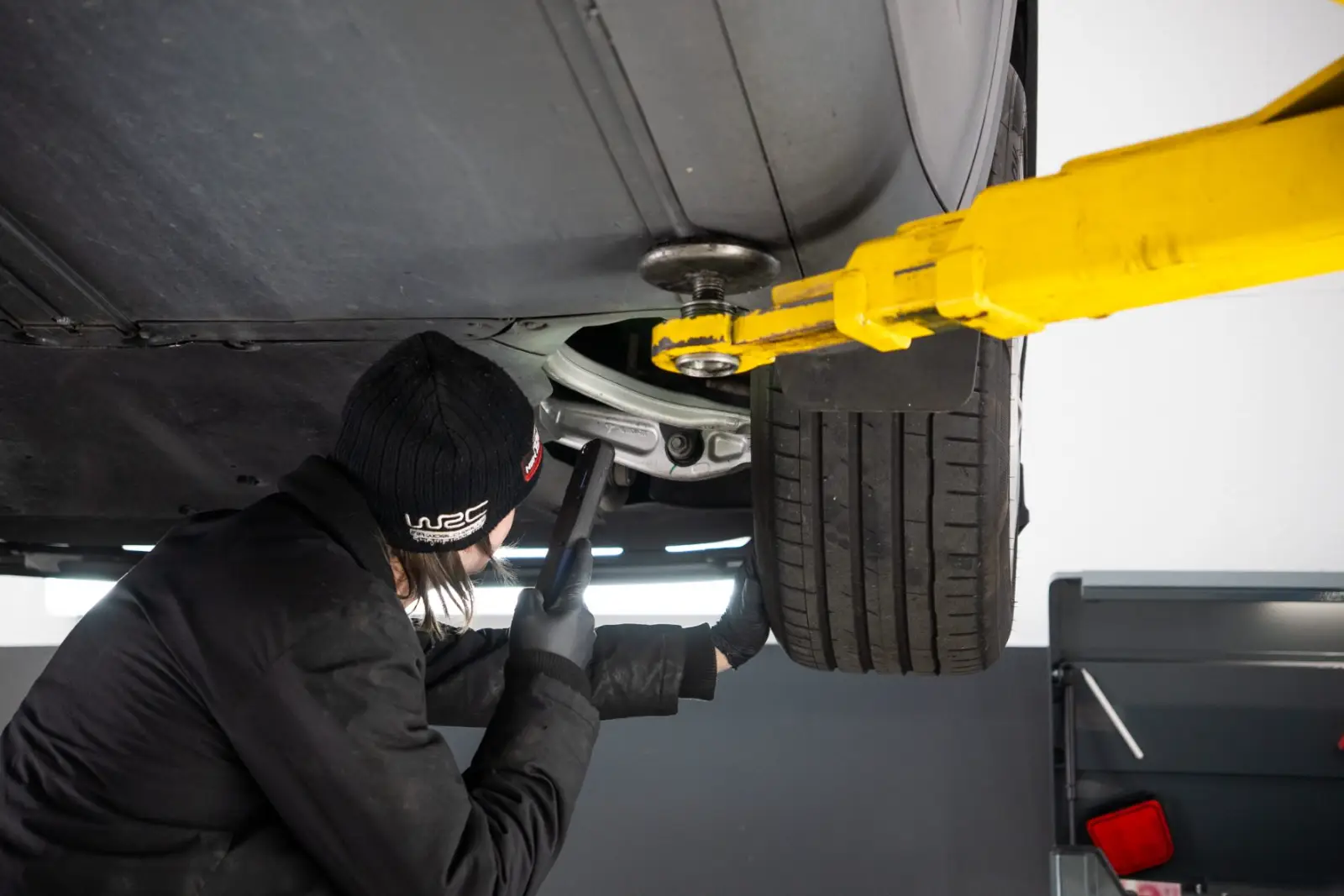 Underbody WOF inspection on a Tesla at GVI Penrose
