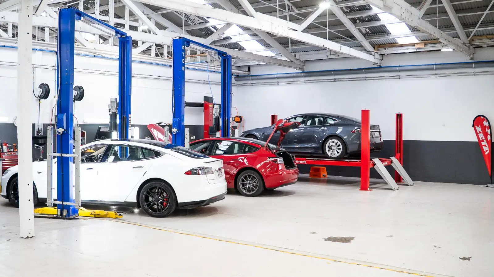 Four Teslas in for service at the GVI workshop in Penrose